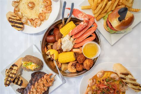 Loves seafood - The DIY seafood door includes a dozen wellfleet oysters shucked with the shells on the side, one dozen littleneck clams, one pound of cooked shrimp, two steamed lobsters, two pounds of King crab ...